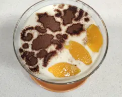 Step <span style="font-weight: normal;">Puedes presentarlo también en copas como muestra la imagen y decorarlo con cacao en polvo.</span> illustration