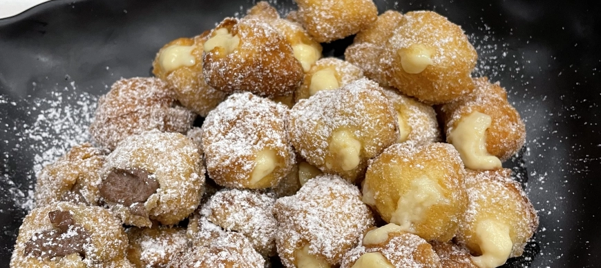 Deliciosos buñuelos rellenos con toque de anís.