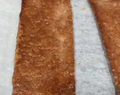 Step Introducimos en el horno previamente precalentado y programamos 15/20 min o hasta que estén bien doradas a 200°C. illustration